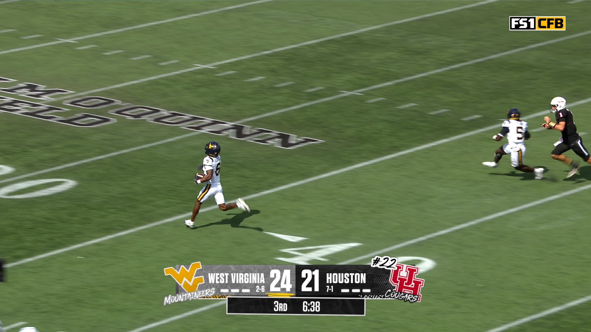 West Virginia’s Jordan Scruggs returns 80-yard pick-six to extend lead over Houston